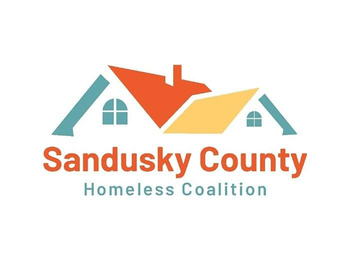 Sandusky County Homeless Coalition logo featuring colorful house rooftops in teal, orange, and yellow