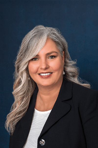 Croghan Bank professional with silver hair and a warm smile in a black blazer