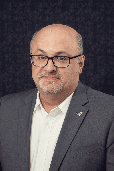 Croghan Bank team member in gray blazer and glasses with company logo pin