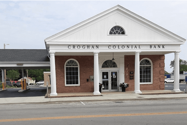 Croghan Colonial Bank branch with white colonial columns, brick facade, and drive-through