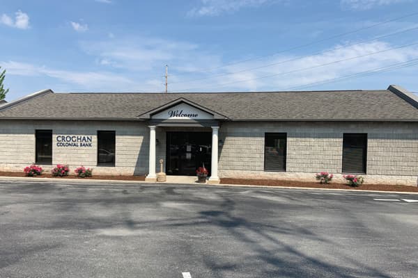 Croghan Colonial Bank branch exterior with stone facade, columns, and "Welcome" signage