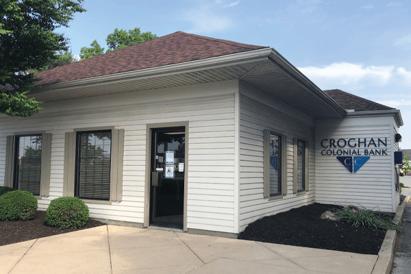 Croghan Colonial Bank small branch exterior with white siding and logo signage near entrance