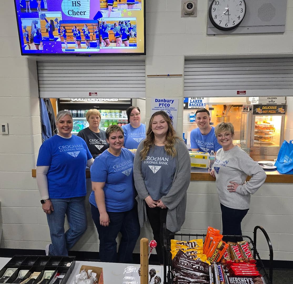Croghan Colonial Bank staff volunteering at a Danbury school concession stand during a sporting event