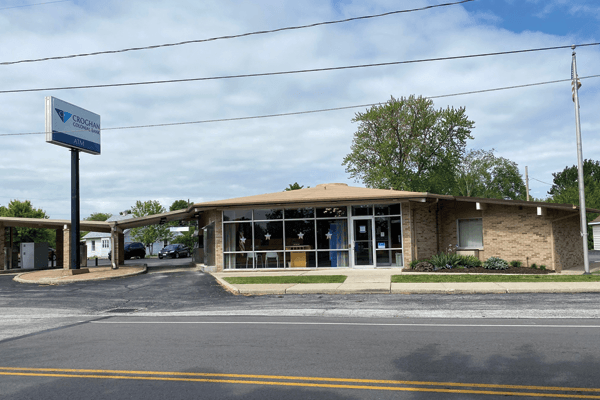 Croghan Colonial Bank branch with drive-through lane, large windows, and roadside signage