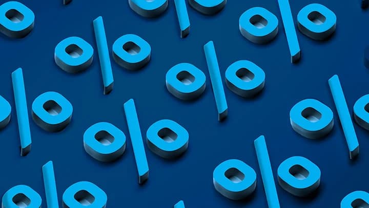 3D blue percentage symbols on dark background representing interest rates