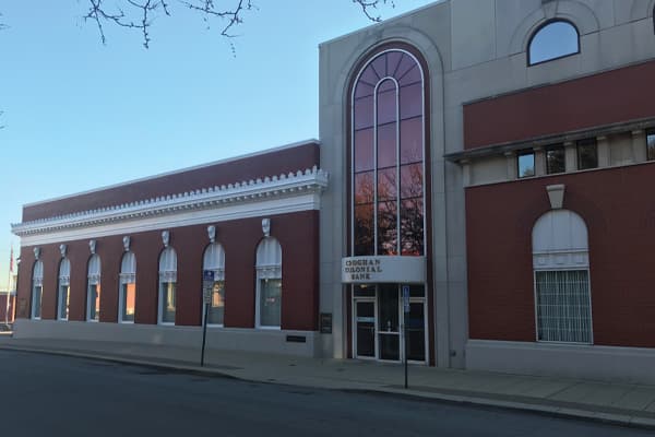 Croghan Colonial Bank classic brick building with arched windows and ornate facade
